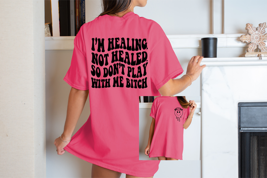 I'm healing not healed don't play with me bitch design hot pink tee